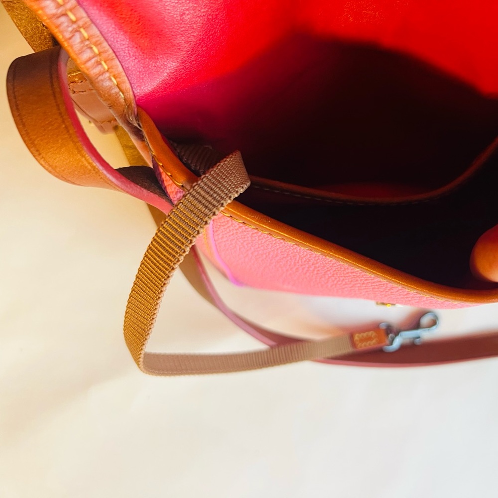 Dooney and Burke vintage pink crossbody, flawless like new condition